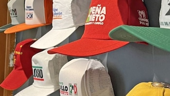 Gorras promoviendo a Enrique Peña