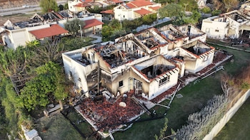 Se ven casas dañadas, tras