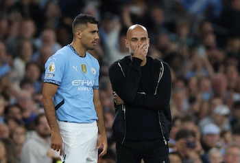 Rodri y Pep Guardiola (Reuters/Lee Smith)
