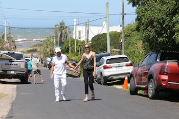 Eduardo y Elina Costantini doafrutan