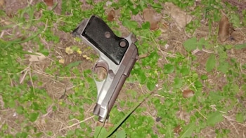 El arma hallada junto al