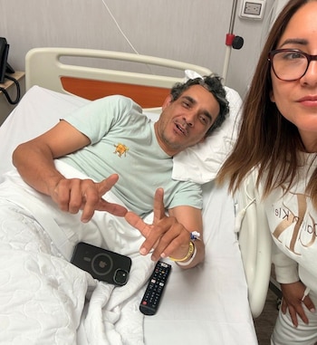 Kelly Portalatino y el hombre con el que impactó.