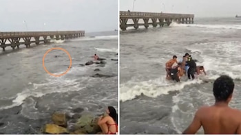 Mujer fue rescatada tras ser arrastrada por el oleaje cerca del muelle de Puerto Colombia: todo quedó en video