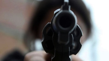 A gunman stops classes to