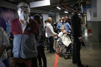 FILE PHOTO: Elderly citzens wait