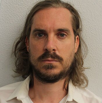 El agente policial Neil Corbel