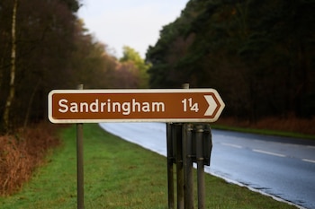 Un cartel para la finca