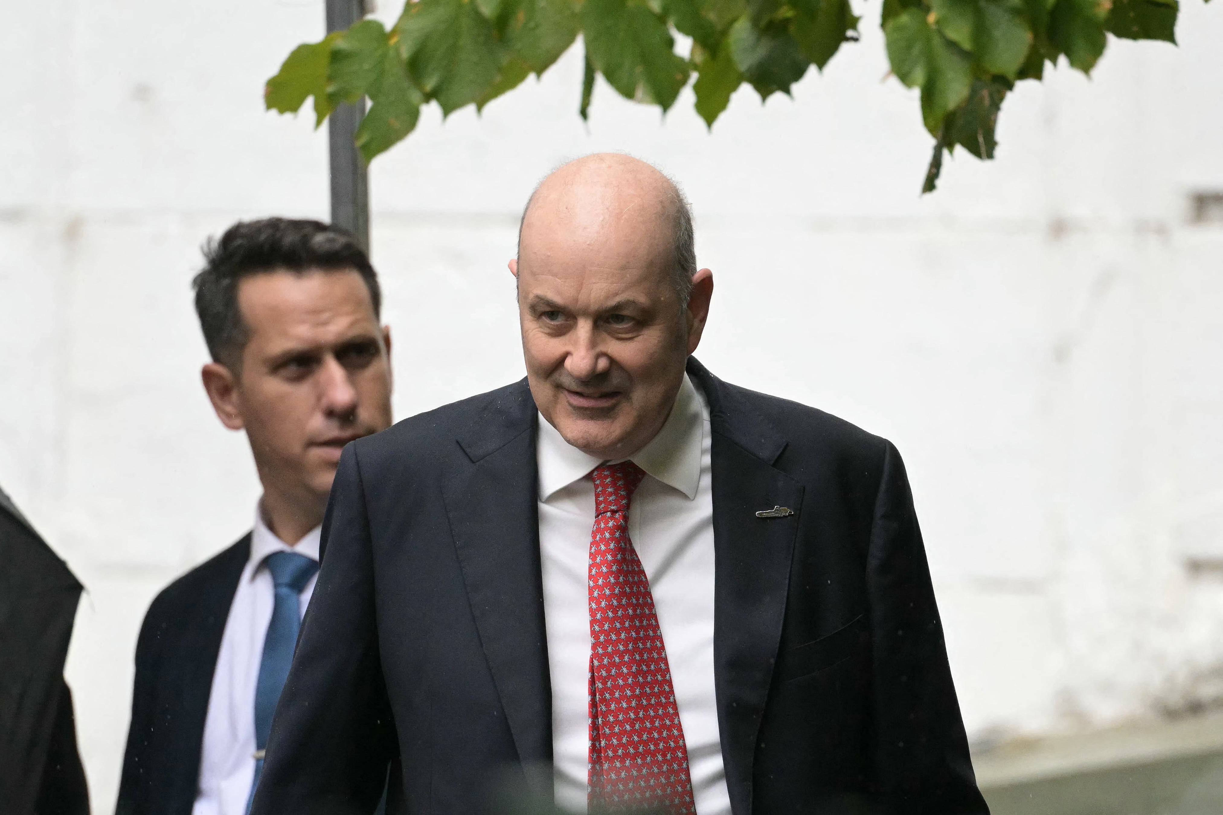 Argentina's Minister of Modernization, Federico Sturzenegger, attends a ceremony to commemorate the 34th anniversary of the bombing at the Israeli embassy in Buenos Aires that killed 29 people and wounded 200, at the Israeli Embassy Square in Buenos Aires on March 17, 2026. (Photo by JUAN MABROMATA / AFP)