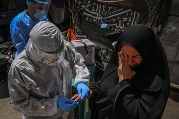 21/05/2020 Un trabajador sanitario de Irak hace una prueba a una mujer para determinar si tiene coronavirus
POLITICA INTERNACIONAL
Ameer Al Mohammedaw/dpa