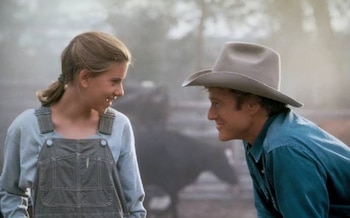 Scarlett Johansson com Robert Redford em 'O Encantador de Cavalos'