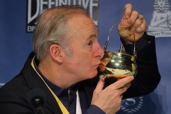 Actor Bob Odenkirk kisses his