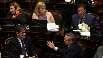 Miguel Angel Pichetto y Juan