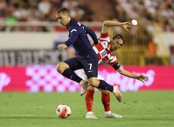 Soccer Football - UEFA Nations League - Group A - Croatia v France - Stadion Poljud, Split, Croatia - June 6, 2022 France's Antoine Griezmann in action with Croatia's Luka Modric REUTERS/Antonio Bronic