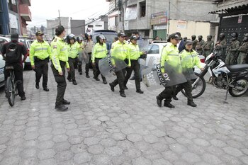 QUITO, Jan. 10, 2024 -- Ecuadorian police patrol in Quito, Ecuador, Jan. 9, 2024. Ecuadorian President Daniel Noboa on Tuesday declared "internal armed conflict" and mobilized the army to combat organized crime linked to drug trafficking, following an escalation in violence in the South American country.
Ecuador's government declared a 60-day state of emergency on Monday with a nighttime curfew to quell violence in cities and inside prisons.
Tuesday's measure followed a day of riots and disturbances at several prisons, including a prisonbreak that saw 39 inmates escape from a facility in the Andean city of Riobamba and the shocking armed takeover of a television station in Guayaquil in mid-broadcast.,Image: 835636602, License: Rights-managed, Restrictions: , Model Release: no, Credit line: Mateo Armas / Xinhua News / ContactoPhoto