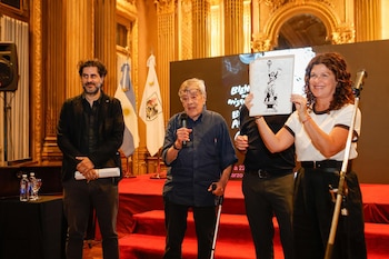 José Muñoz (centro, entre Tute