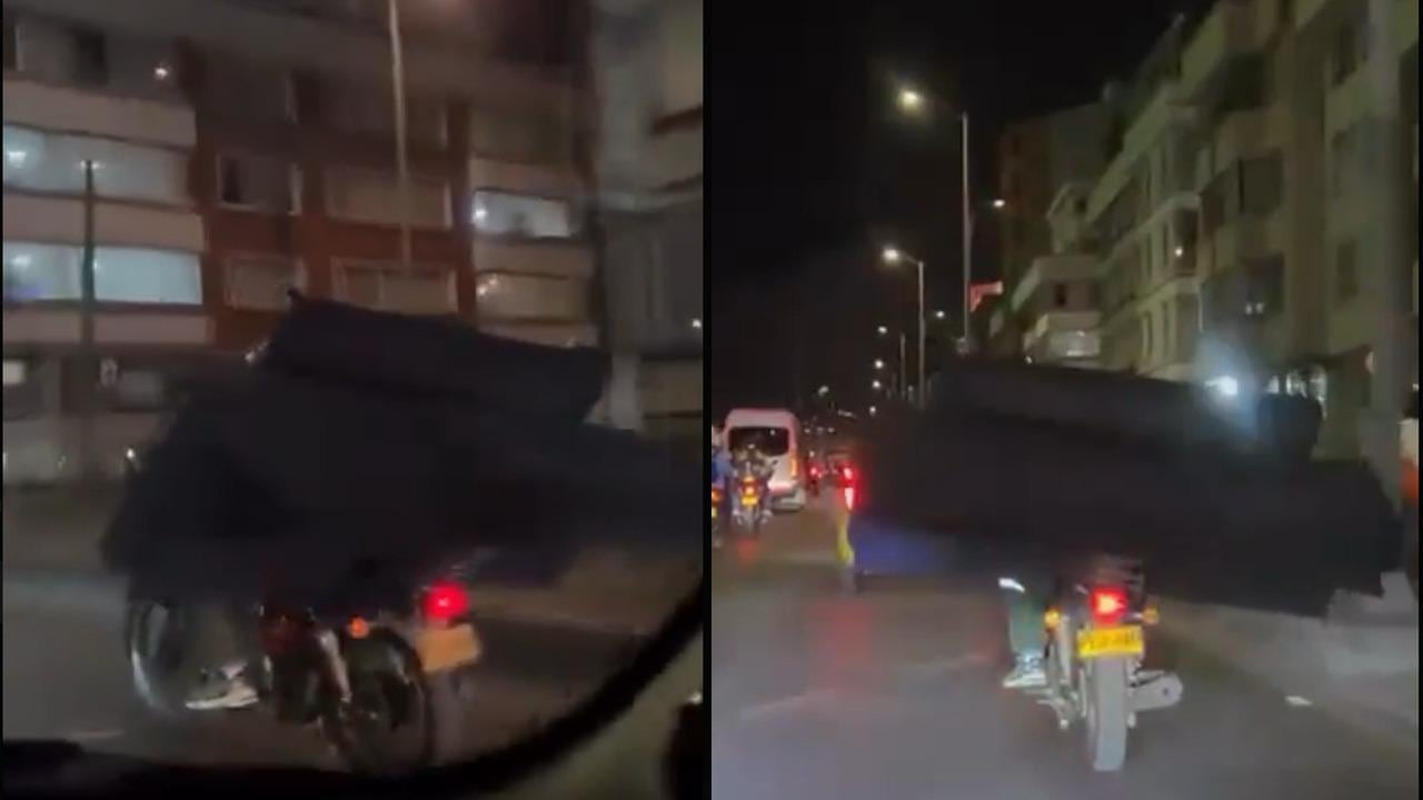 Motociclista fue grabado transportando un sofá por las calles de Bogotá