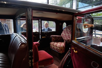 A popemobile used by successive popes is displayed at "A Century of the Popemobile," an exhibition tracing 100 years of papal transportation, from Pope Pius XI's first automobile in 1930 to modern popemobiles, at the Vatican Museum