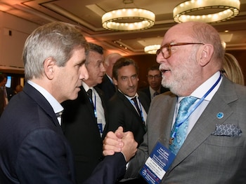 Caputo con Martín Cabrales, tras