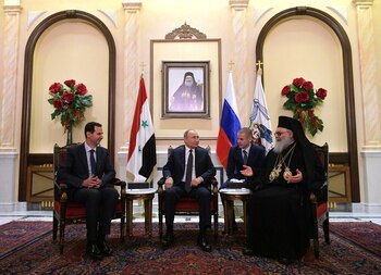 Vladimir Putin y Bashar Al