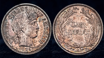Anverso y reverso de una moneda de plata envejecida de 1894 con la inscripción One Dime y la ceca S.
