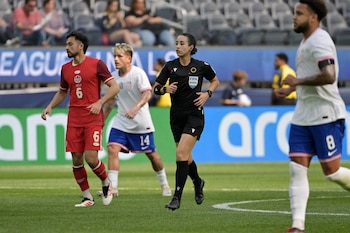 Mar 23, 2025; Inglewood, California, USA; FIFA referee Katia Itzel Garcia runs on the field during the first half of the Concacaf Nations League third place match between the United States of America and Canada at SoFi Stadium. Mandatory Credit: Jayne Kamin-Oncea-Imagn Images
