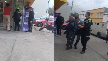 Dos individuos ingresaron al local comercial mientras se adelantaba el procedimiento de recarga del cajero automático - crédito Policia Metropolitana de Bogotá