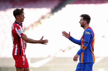 Marcos Llorente y Lionel Messi
