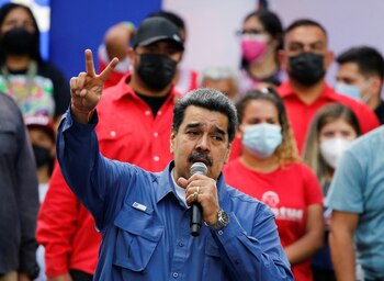 Venezuela's President Nicolas Maduro addresses the crowd during a government rally to mark Youth Day, in Caracas, Venezuela February 12, 2022. REUTERS/Leonardo Fernandez Viloria