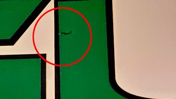 El orificio de bala en