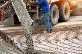 Cement,Trucks,In,The,Construction,Area,Are,Pouring,Cement.
