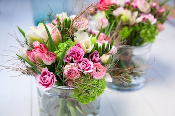 Flores en un jarrón. (Adobe