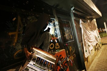 A person comes out of