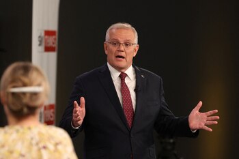 Australian incumbent Prime Minister Scott Morrison speaks during the first leaders' debate of the 2022 federal election, at the Gabba sports stadium, in Brisbane, April 20, 2022. AAP/ Jason Edwards via REUTERS ATTENTION EDITORS - THIS IMAGE WAS PROVIDED BY A THIRD PARTY. NO RESALES. NO ARCHIVE. AUSTRALIA OUT. NEW ZEALAND OUT. NO COMMERCIAL OR EDITORIAL SALES IN NEW ZEALAND. NO COMMERCIAL OR EDITORIAL SALES IN AUSTRALIA.