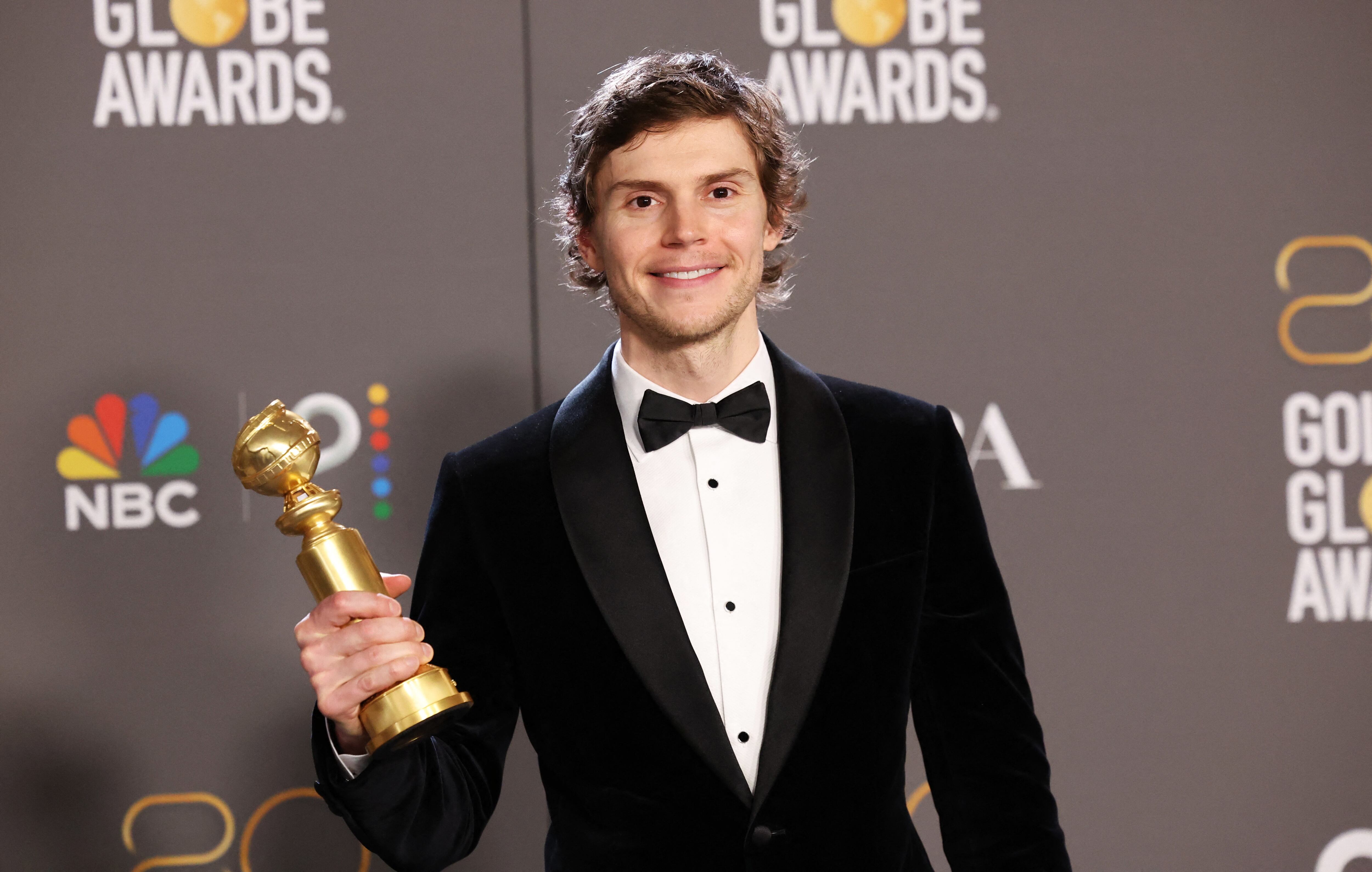Evan Peters poses with his award for Best Actor in a Limited Series, Anthology Series, or Television Motion Picture, for 