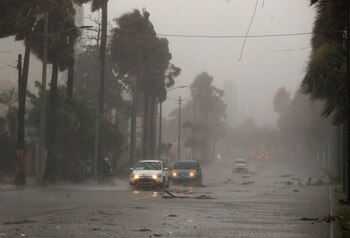 Vista de uuna intensa lluvia durante el paso de una tormenta tropical, en una fotografía de archivo. EFE/ Orlando Barría