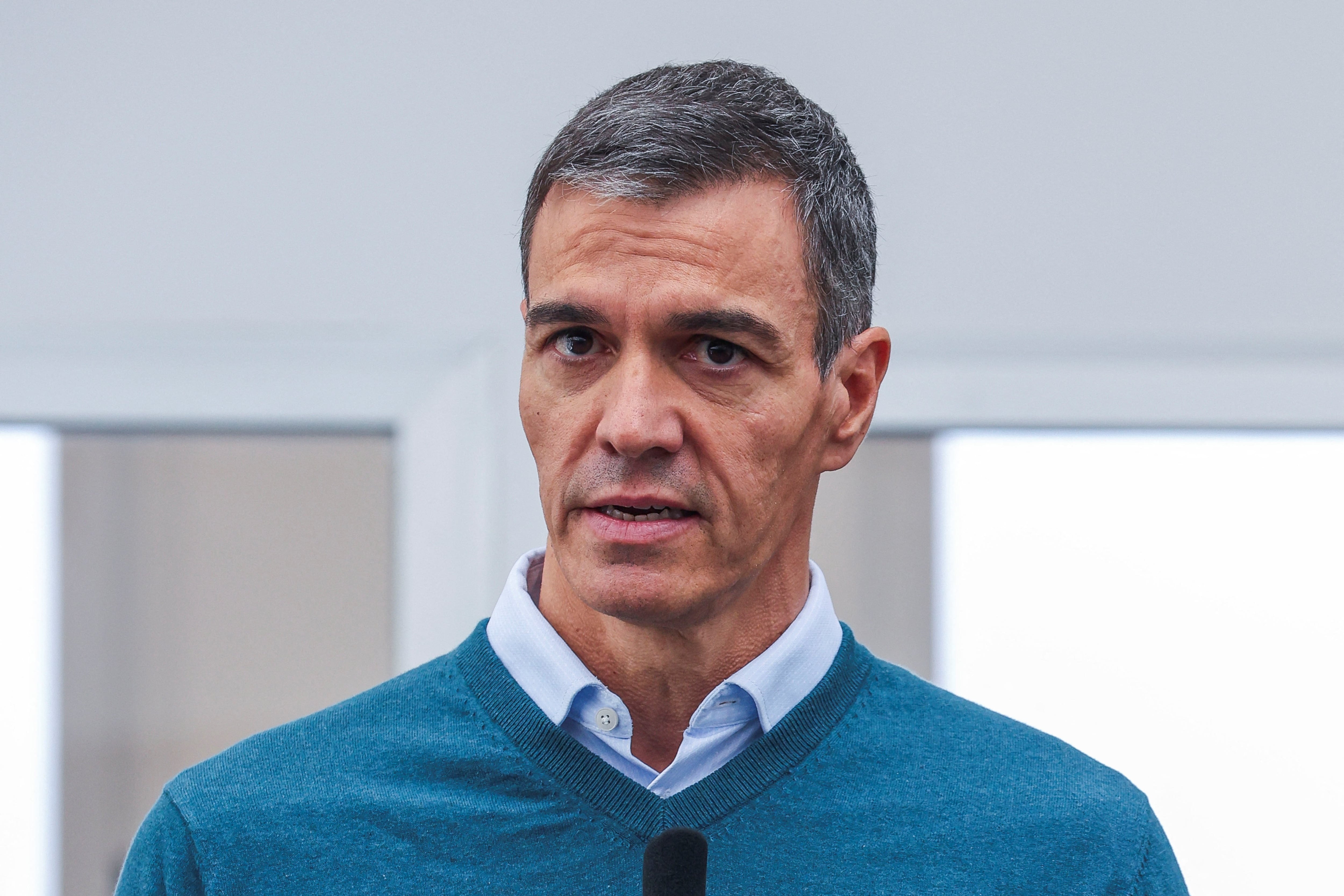 Spain's Prime Minister Pedro Sanchez speaks during a press conference as he visits a command center coordinating the emergency response following torrential rain and flooding in Oliva, Valencia province, Spain, October 20, 2026. REUTERS/Eva Manez