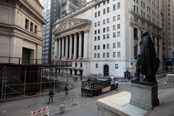 Workers remove barricades in front