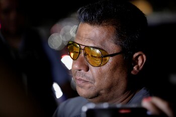 Mario Escobar, father of 18-year old missing student Debanhi Escobar, addresses the media outside the Nueva Castilla motel after authorities found the body of a woman in a water tank, which he says belongs to his daughter, in Escobedo, Mexico April 22, 2022. REUTERS/Daniel Becerril