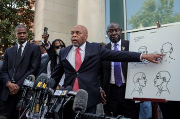 Attorney Wayne Kandael points a drawing that shows the fatal wound that killed Andrew Brown Jr., at a news conference in Elizabeth City, N.C., on Tuesday, April 27, 2021. Lawyers for Brown's family said Tuesday that a private autopsy paid for by the family showed that he was hit by five bullets and killed by a shot to the head. (Carlos Bernate/The New York Times)