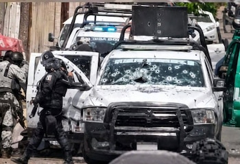 Bloqueos Ataques Armados Michoacán policías heridos Narco en México