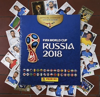 This photo taken on April 20, 2018 shows collectible albums and cards for the 2018 Russia football World Cup, created by the Panini Group at their factory in Modena, northern Italy.
The Panini Group holds the rights for the collectible cards of the 2018 Russia football World Cup. / AFP PHOTO / MARCO BERTORELLO
