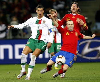 Andrés Iniesta y Cristiano Ronaldo