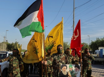 Miembros de Harakat Hezbollah al