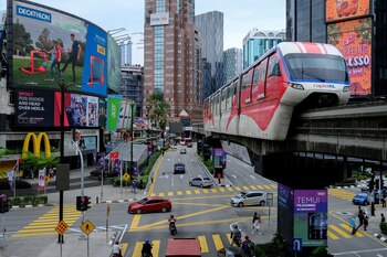 A Rapid KL train, operated by Prasarana Malaysia Bhd., travels along an elevated track in Kuala Lumpur, Malaysia, on Tuesday, Jan. 12, 2021. Malaysia's king declared a state of emergency in the Southeast Asian nation, in a move that could allow the embattled government to delay elections as it tackles the worsening coronavirus pandemic.