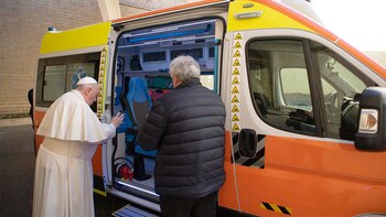 Pope Francis blesses an ambulance