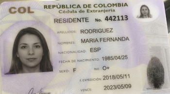 Cédula de Extranjería colombiana de Maria Fernanda Rodriguez. Muestra su foto, datos personales, y huella dactilar. El documento es de color claro con patrones de seguridad.