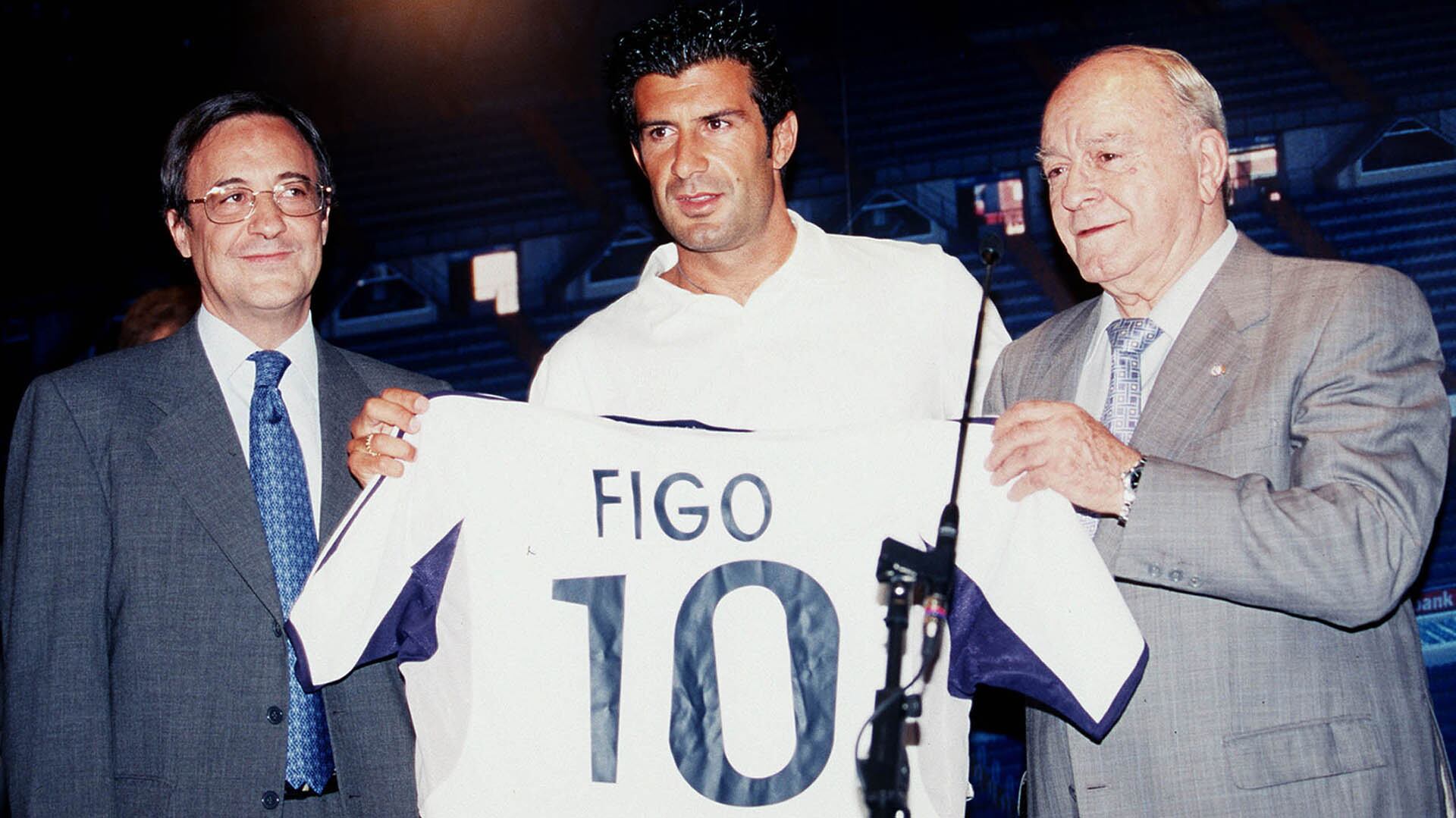 Real Madrid President Florentino Perez - left - and Real Madrid legend Alfredo di Stefano - right- present Luis Figo his shirt after Figo signed for Real Madrid from arch rivals Barcelona Football Madrid, Spain 24/07/2000 Photo: Miguelezsports © Sporting Pictures (UK) Ltd www.sportingpictures.com Tel: +44 (0)20 7405 4500 Fax: +44 (0)20 7831 7991 Mandatory Credit: Action Images / Sporting Pictures
