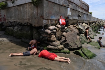 Bathers enjoy a summer day