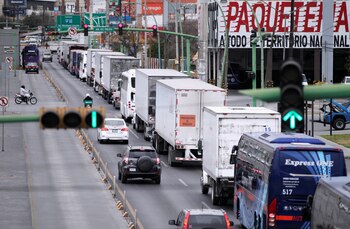 Trailer trucks take part in a caravan to protest against the Yaqui indigenous roadblocks in the state of Sonora, that are affecting the trade with the U.S. according to local media, in Monterrey, Mexico March 2, 2021. REUTERS/Daniel Becerril