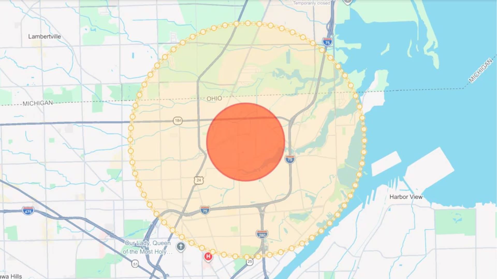 Un mapa de la zona limítrofe entre Ohio y Michigan delimita un sector circular rojo y un perímetro punteado alrededor de varias autopistas. (Google Maps )